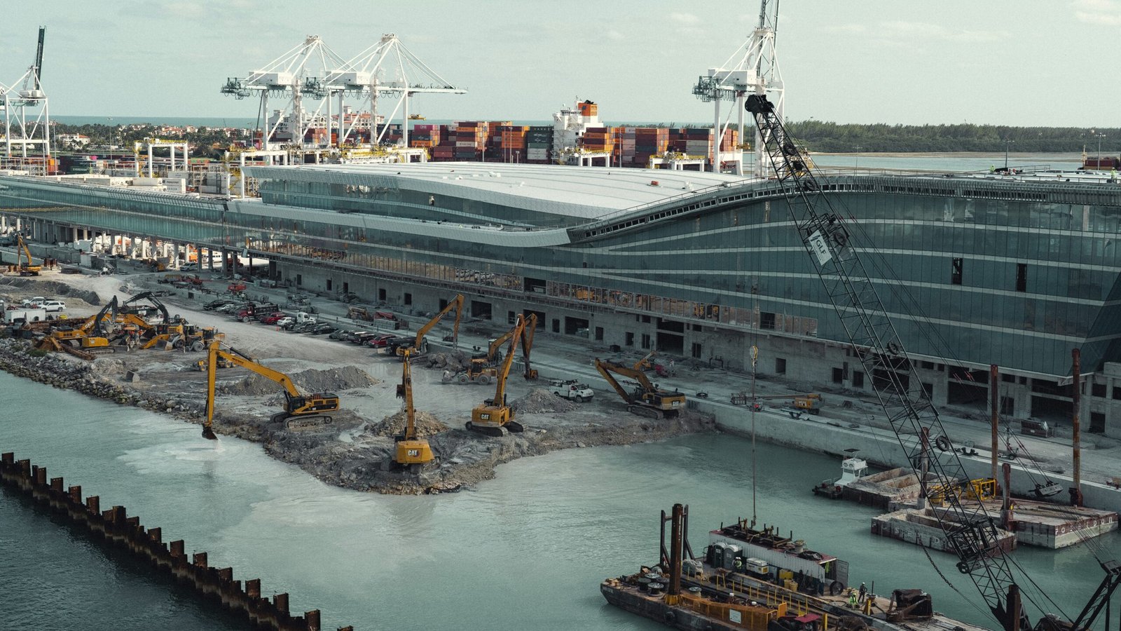 a large ship is docked at a dock